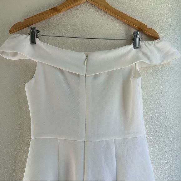 BCBGeneration | Elegant Off-Shoulder White Jumpsuit - Picture 6 of 12